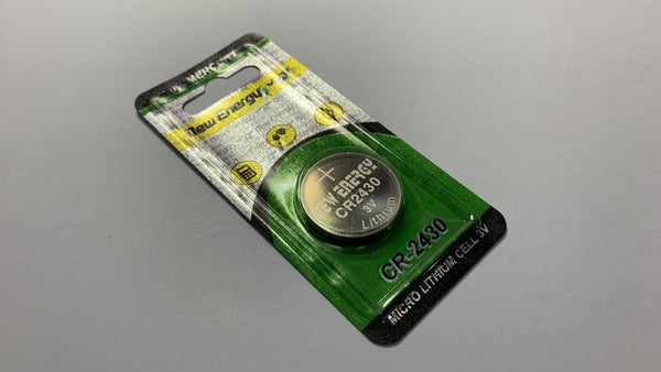 Pila tipo moneda o boton de Litio CR2430 marca New Energy